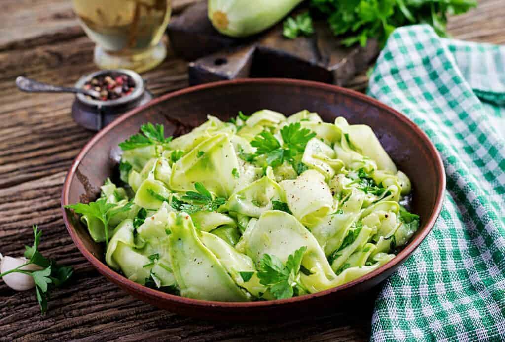Salad of marinated zucchini in spices. Vegan food. Healthy meal.